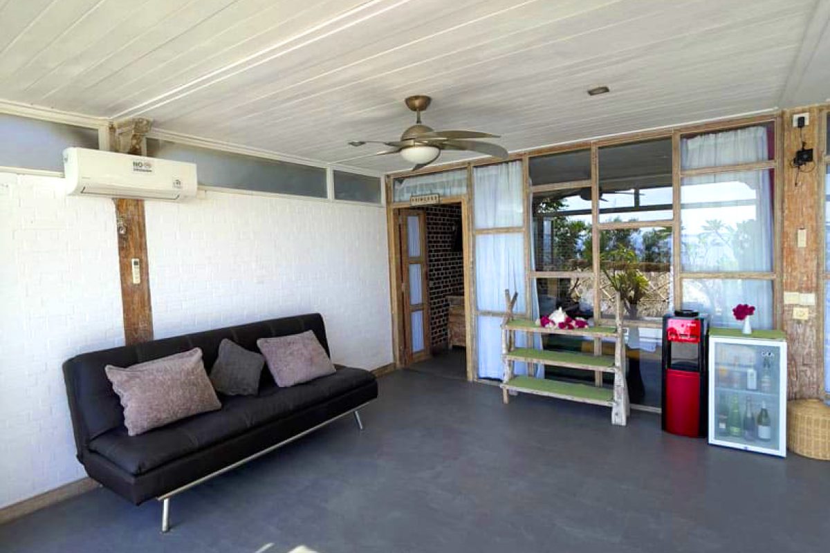 princess-of-mentigi-bay-ocean-view-room-outdoor-sofa-and-kitchen